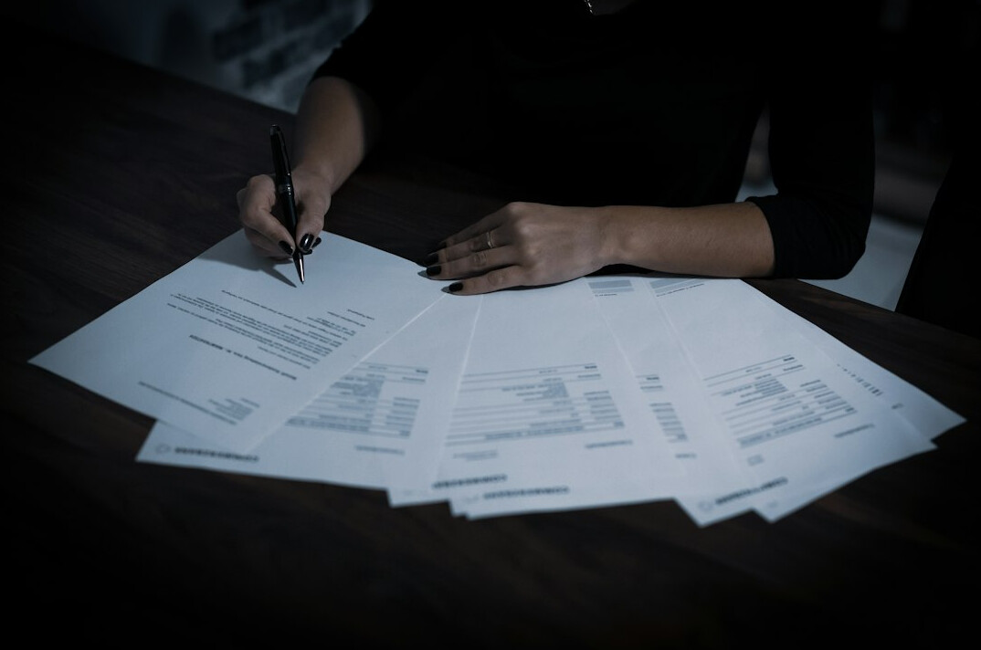 investigator reviewing documents